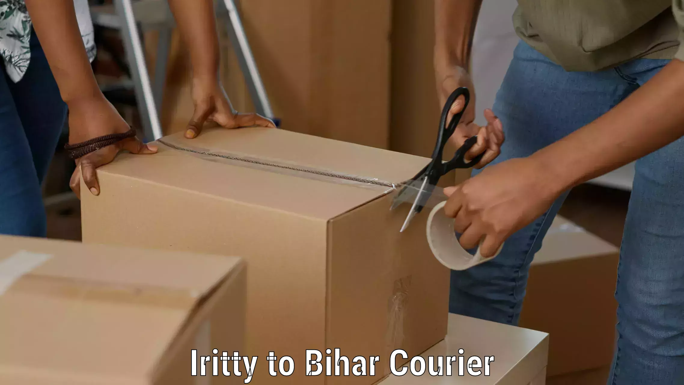 Dynamic courier services Iritty to Bhawanipur Rajdham