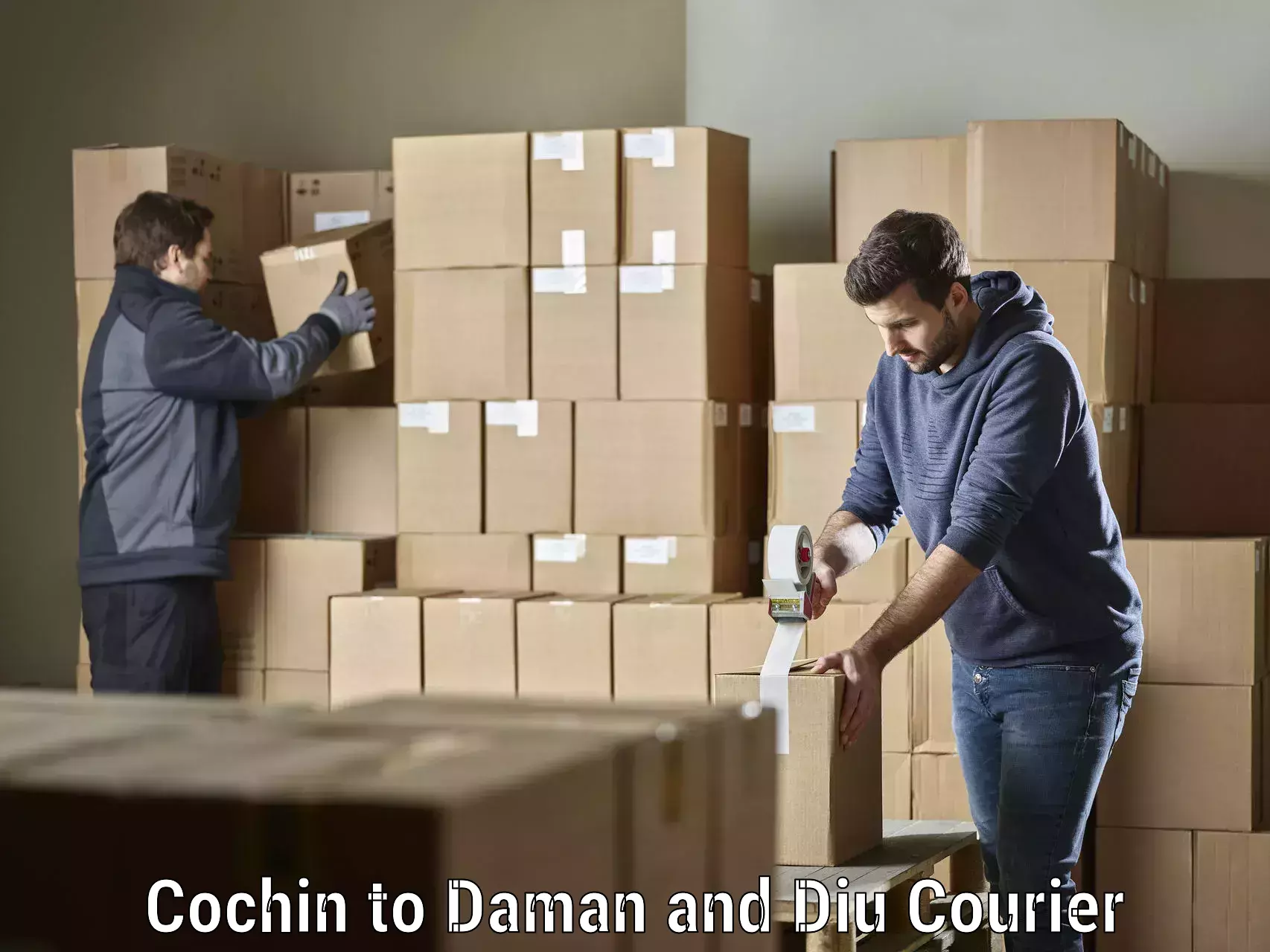 24/7 courier service Cochin to Daman