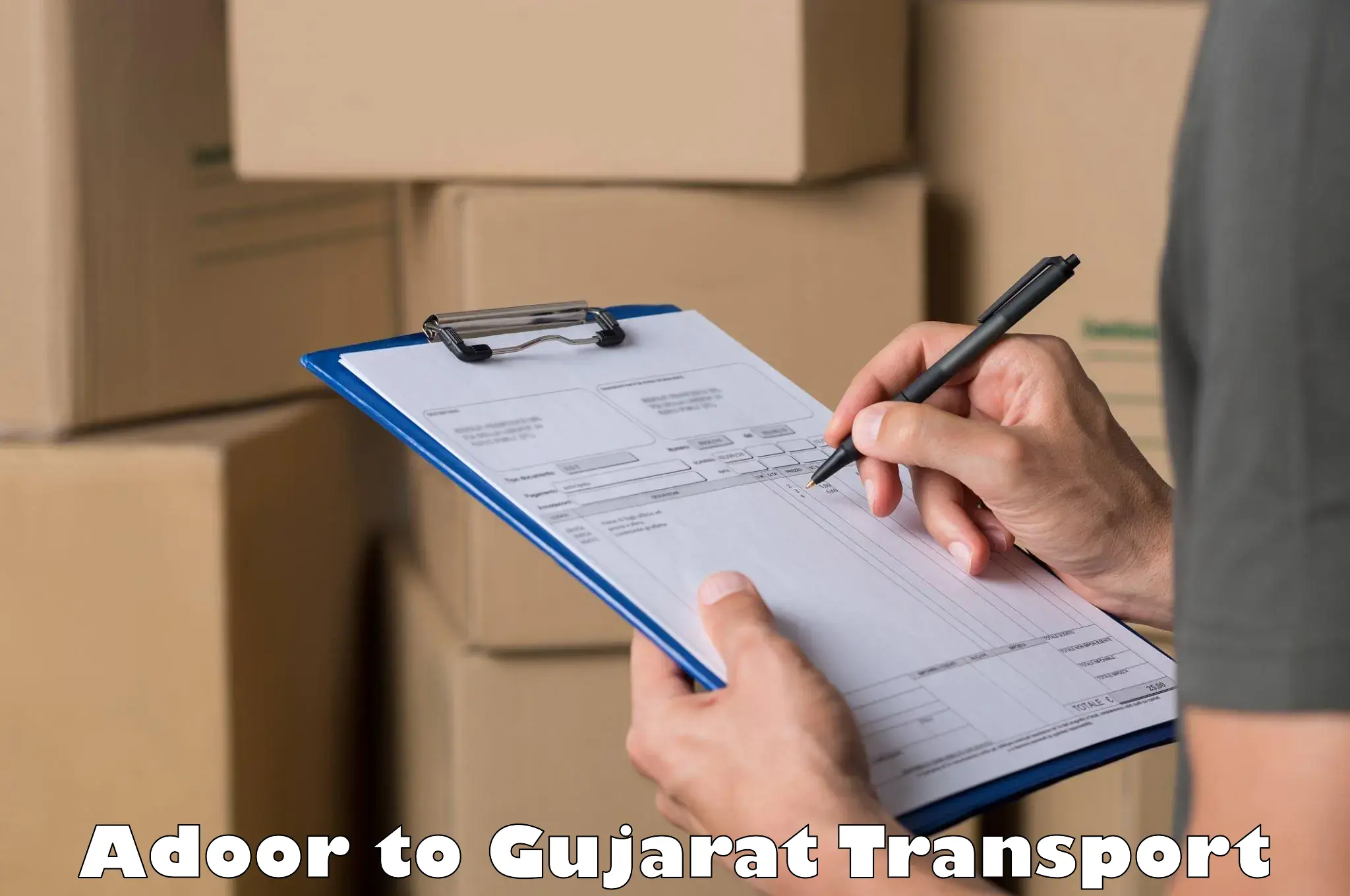Truck transport companies in India Adoor to Gandhinagar