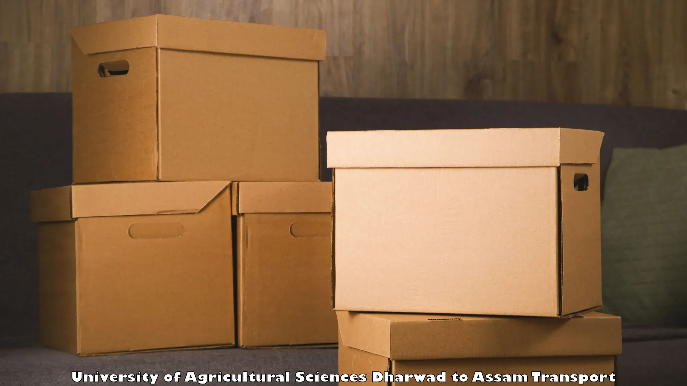 Package delivery services University of Agricultural Sciences Dharwad to Golaghat